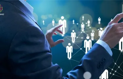 A business professional in a suit holding a smartphone, with futuristic digital icons overlayed, representing global connectivity, cybersecurity, and workforce management