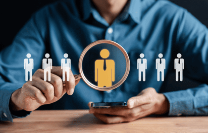 HR specialists collaborating on employee data through outsourced HR services.